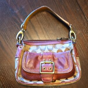 Coach Pink and Brown Wristlet Clutch with Chic Design